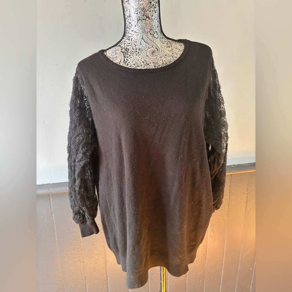 Sioni Black Top with Floral Detail
